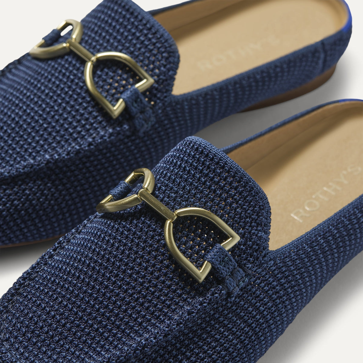 Close up of the toe and hardware of The Double Bit Loafer Mule in Blue Raffia-Knit.