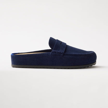 side | The Penny Clog in ReVelvet™ Navy shown from the side.